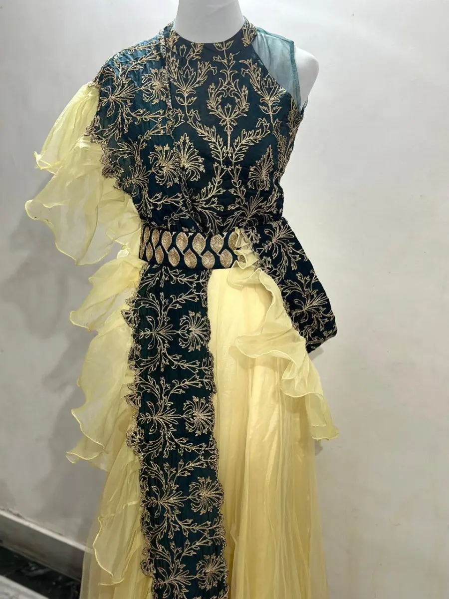 Embroidered top with golden skirt