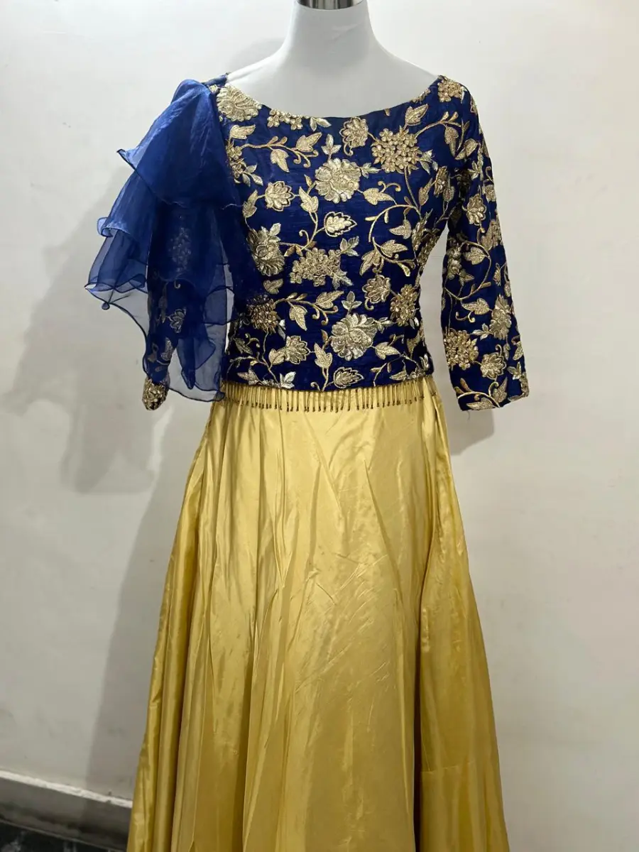 Blue top with golden skirt